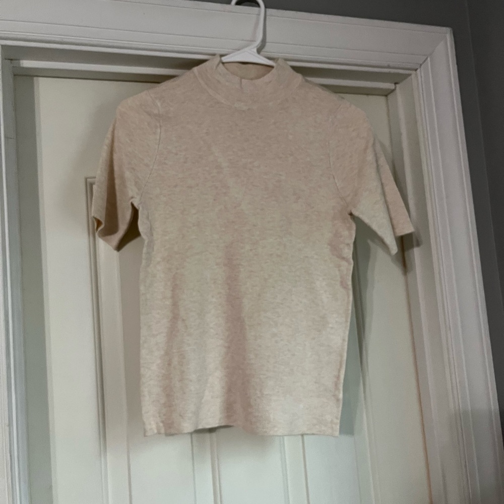 Fitted mock neck top.